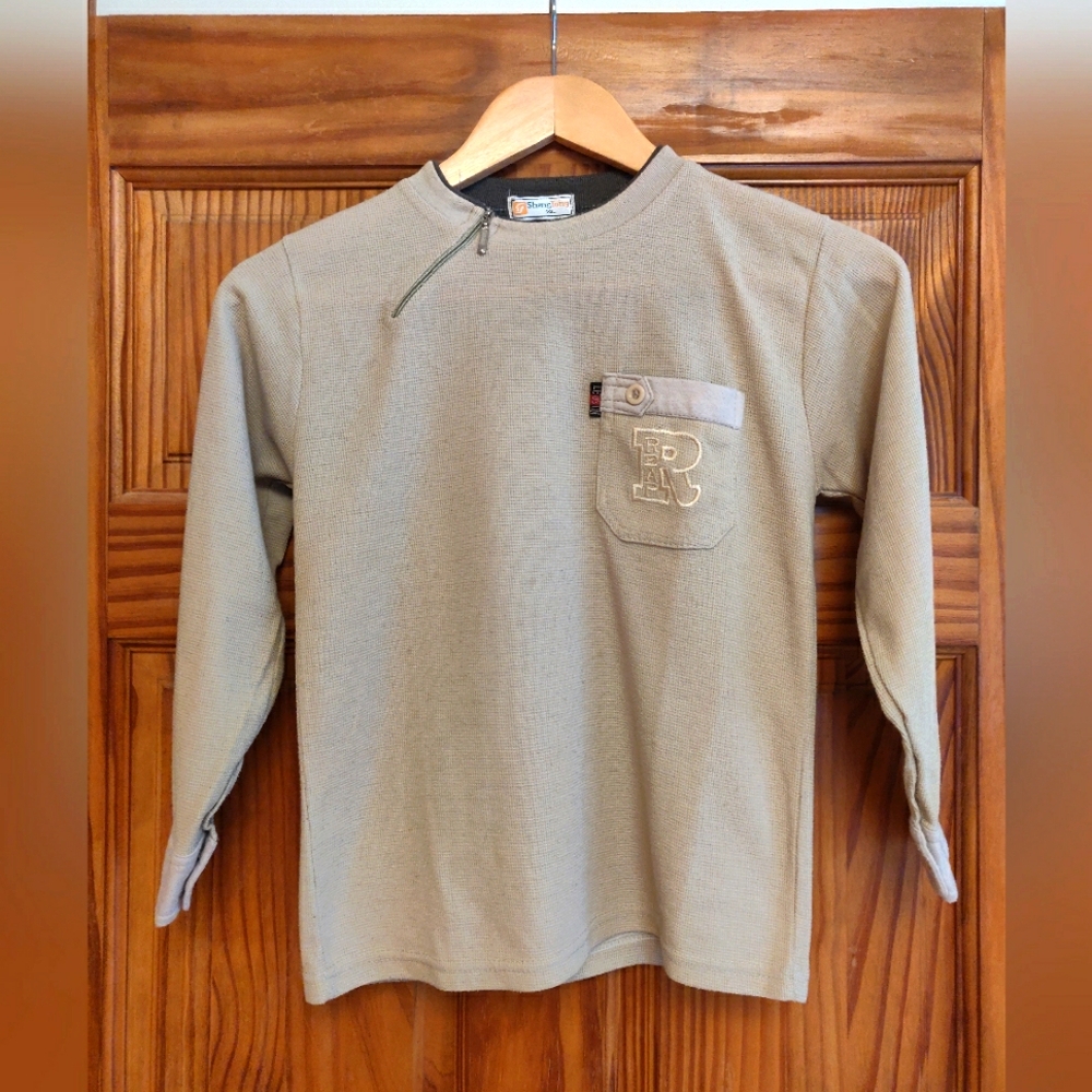 Cream Long Sleeve Shirt with a Unique Pocket Design Finds
